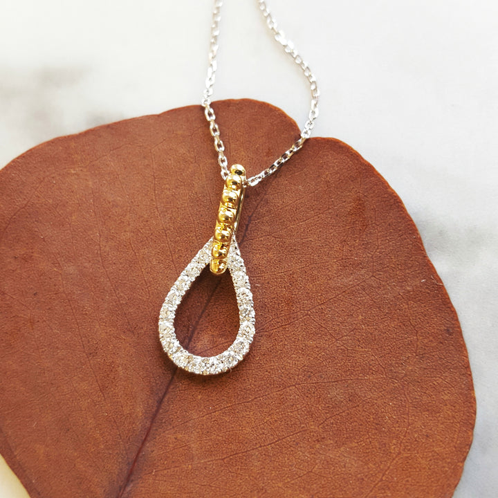 Two Tone Looping Accent Diamond Pendant