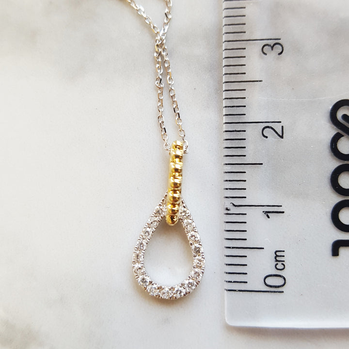 Two Tone Looping Accent Diamond Pendant